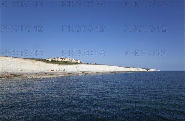 White cliff coastline with Roedean private school for girls.