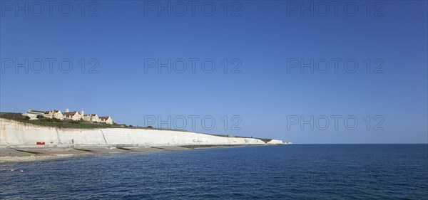 White cliff coastline with Roedean private school for girls.