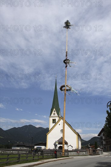 Malbaum or Maypole outside village church.