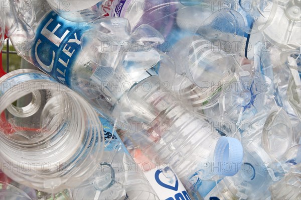 Plastic bottles attached to a wire fence at the WOMAD festival to highlight the need to recycle non-sustaninable materials.