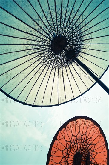 Parasol Looking up at the underside of traditional South East Asian paper parasols.