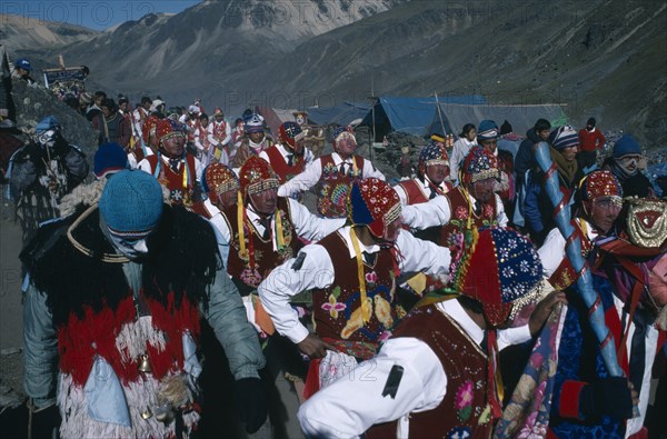 Peru, Cusco, Vilcanota Mountains, Ice Festival of Qoyllur Riti. Pre Columbian in origin but of Christian significance today with pilgrimage to place of Christs appearance. Procession of masked dancers. Photo : Eric Lawrie