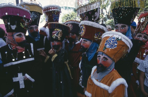 Mexico, Morelos, Cuernavaca, La Festa de la Asoncion de Maria. Masked group outside Cuernavaca during festival. Photo : Robert Aberman