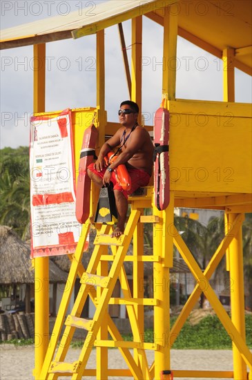 Mexico, Oaxaca, Puerto Escondido, Playa Zicatela Lifeguard station. Photo : Nick Bonetti