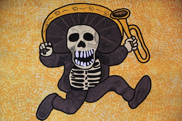 Mexico, Bajio, Queretaro, Wall art depicting skeleton in sombrero holding a trumpet. Photo : Nick Bonetti