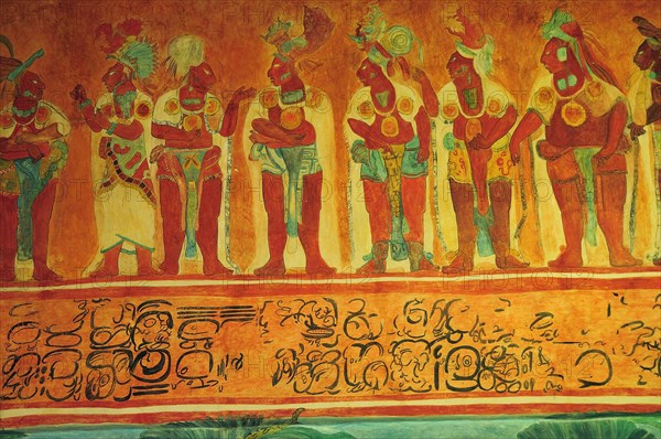 Mexico, Federal District, Mexico City, Museo Nacional de Antropologia Replica wall painting from Chiapas depicting line of figures with symbols below.. Photo : Nick Bonetti