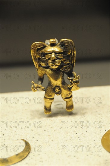 Mexico, Federal District, Mexico City, Museo Nacional de Antropologia Small gold figure.. Photo : Nick Bonetti