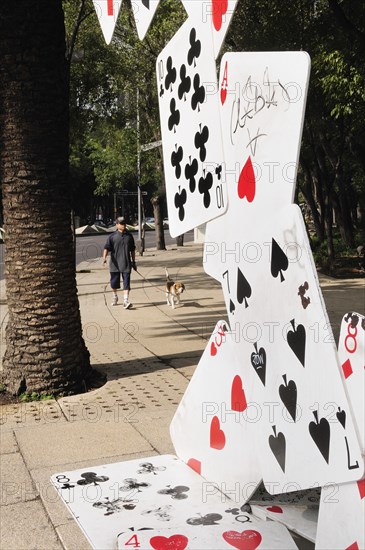 Mexico, Federal District, Mexico City, Bench designed as pack of falling cards on the Paseo de la Reforma Zona Rosa. Photo : Nick Bonetti