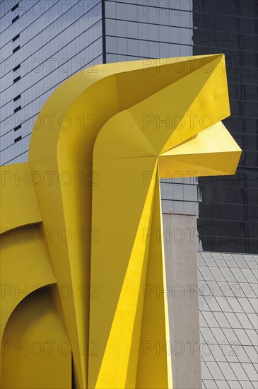 Mexico, Federal District, Mexico City, Detail of yellow Little Horse sculptural form in front of mirrored exterior of Torre Caballito on Reforma. Photo : Nick Bonetti