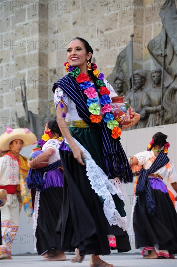 Mexico, Jalisco, Guadalajara, Plaza Tapatia Woman folk dancer from Guerrero State performing in Carnival.. Photo : Nick Bonetti