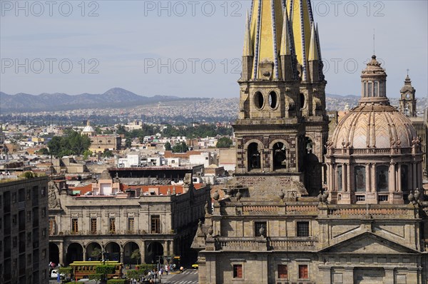 Mexico, Jalisco, Guadalajara, View of Cathedral dome and twin spires with city to the north and Plaza Guadalajara in near distance. Photo : Nick Bonetti