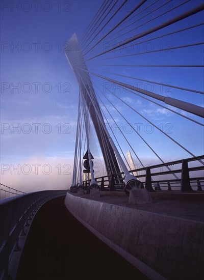 France, Bretagne, Finistere, Ile de Crozon. The new Pont de Terenez suspension bridge over the River Aulne to Crozon from the east side footway in early morning.. Photo : Bryan Pickering