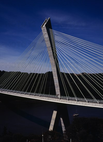 France, Bretagne, Finistere, Ile de Crozon. The new Pont de Terenez suspension bridge opened April 2011. From hillside above the River Aulne showing suspension supports. View south. Photo : Bryan Pickering