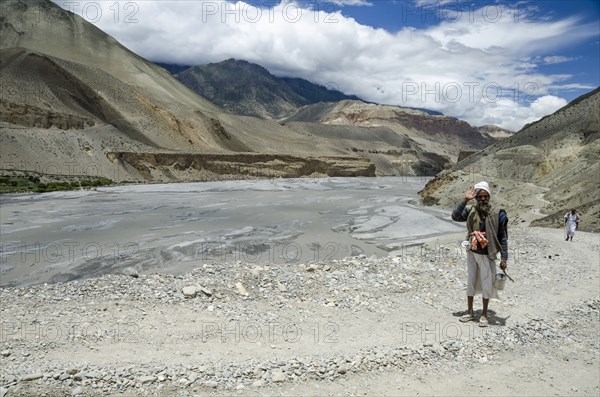 Nepal, Upper Mustang, Kali Gandaki gorge, Man returning from worship. Photo : Sergey Orlov