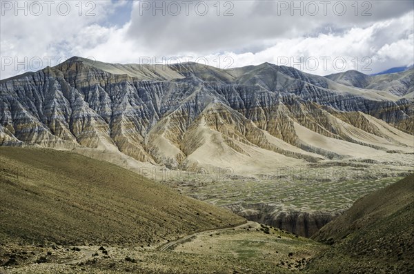 Nepal, Upper Mustang, Landscape, Layered mountain structure near Lo Manthang city. Photo : Sergey Orlov