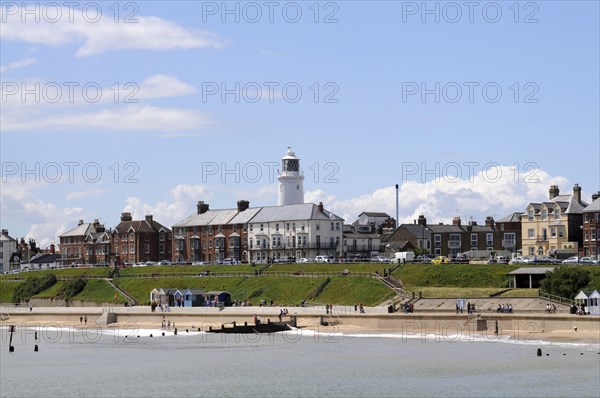 England, Suffolk, Southwold, Historic seafront with lighthouse from the pier. Photo : Bob Battersby