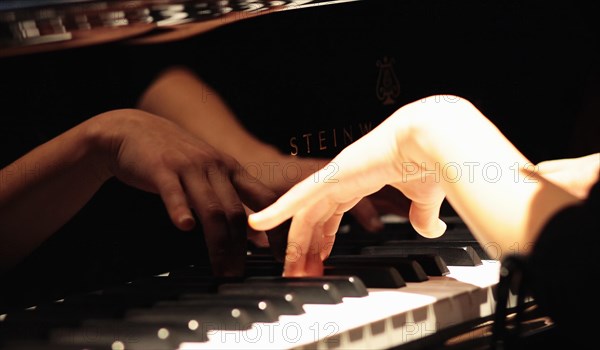 Music, Instruments, Keyboards, Piano Close of of musicians hands playing Steinway. Photo : Sean Aidan