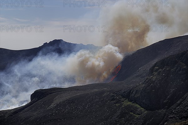 Ireland, County Down, Mourne Mountains, Gorse fire races up Slieve Lamagan. Photo : Hugh Rooney