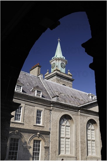 Ireland, County Dublin, Dublin City, Kilmainham Royal Hospital clock tower viewed through an arch of the courtyard cloister. Photo : Hugh Rooney