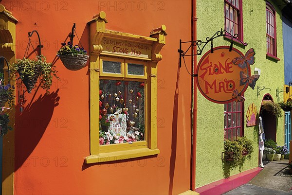Ireland, County Cork, Kinsale, Colourful facades in market place with flower pots. Photo : Hugh Rooney