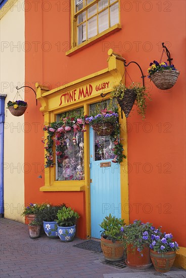 Ireland, County Cork, Kinsale, Colourful facade in market place with flower pots. Photo : Hugh Rooney