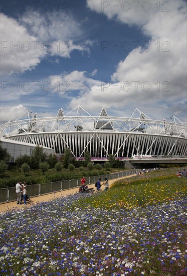 England, London, Stratford View of the 2012 Olympic Stadium with meadow planting in the foreground. Photo : Adina Tovy - Amsel