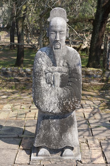 Vietnam, Hue, A stone statue of a man at the tomb of Emperor Tu Duc. Photo : Mel Longhurst