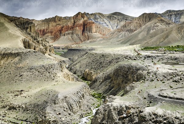Nepal, Upper Mustang, Ghemi, Colorful layered mountains and eroded plateau along the route from Ghemi to Lo Manthang. Photo : Sergey Orlov