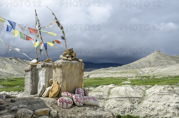 Nepal, Upper Mustang, Lo Manthang, Chortens and the distant ancient ruins at Lo Manthang. Photo : Sergey Orlov