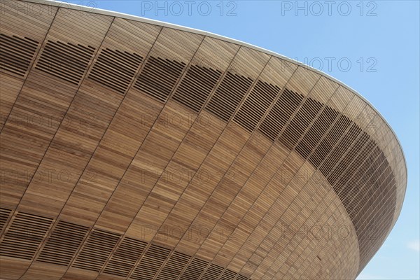 England, London, Stratford Olympic Park Exterior of the wood clad Velodrome arena. Photo : Sean Aidan