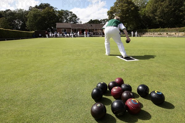 England, East Sussex, Uckfield, People playing flat lawn bowls at local club. Photo : Sean Aidan