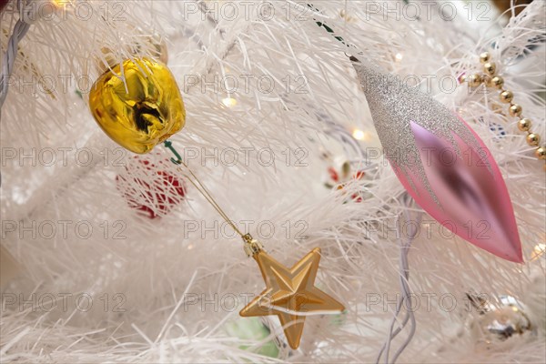 Festivals, Religious, Christmas, Detail of tree decorated with lights tinsel and various baubles. Photo : Stephen Rafferty