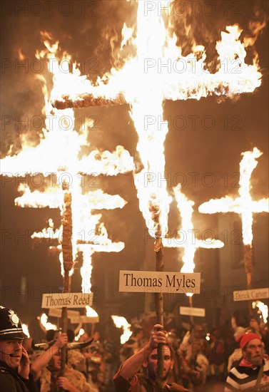 Burning crosses at  the annual bonfire night parade held in Lewes, East Sussex. The festival celebrates 17 protestant martyrs killed in the 1500's