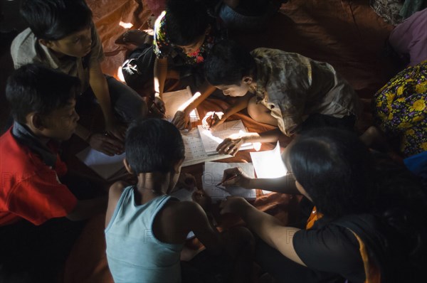 Bangladesh, Chittagong, Street children learning in a centre run by an NGO charity. 
Photo Nic I Anson / Eye Ubiquitous