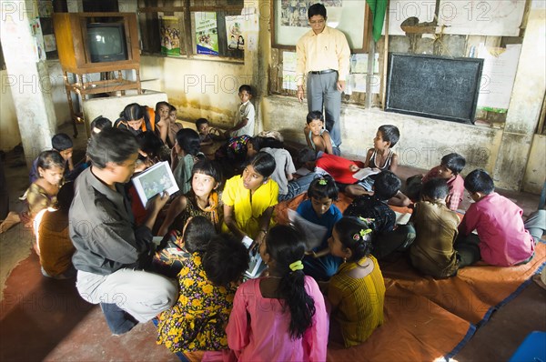 Bangladesh, Chittagong, Street children learning in a centre run by an NGO charity. 
Photo Nic I Anson / Eye Ubiquitous