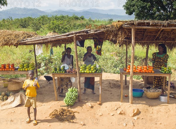 Burundi, Cibitoke Province, Buganda, Market stall selling vegetables beside the road. . 
Photo Nic I Anson / Eye Ubiquitous