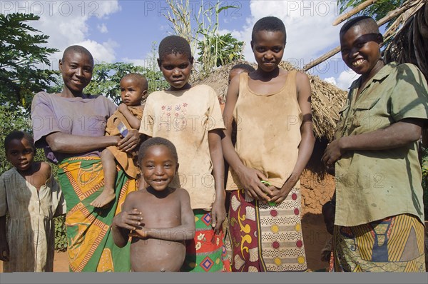 Burundi, Cibitoke Province, Kirundo, Burundi Kirundo A family beside the road living in poverty child with obvious worms. 
Photo Nic I Anson / Eye Ubiquitous