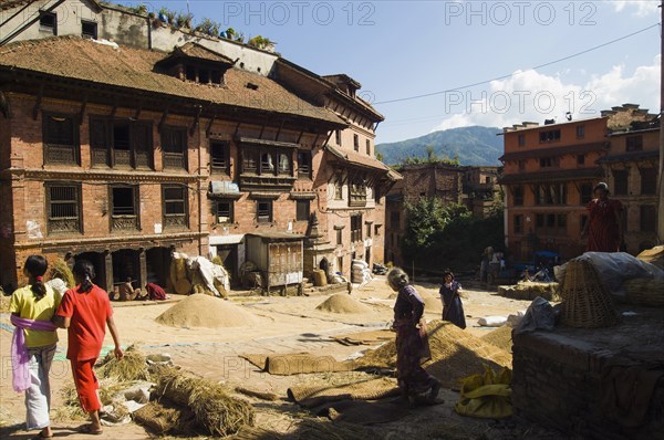 Nepal, Bhaktapur, Grain drying in sun. 
Photo Nic I Anson / Eye Ubiquitous