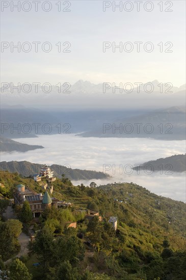 Nepal, Nagarkot, View across clouded valley towards Himalayan mountains. 
Photo Nic I Anson / Eye Ubiquitous