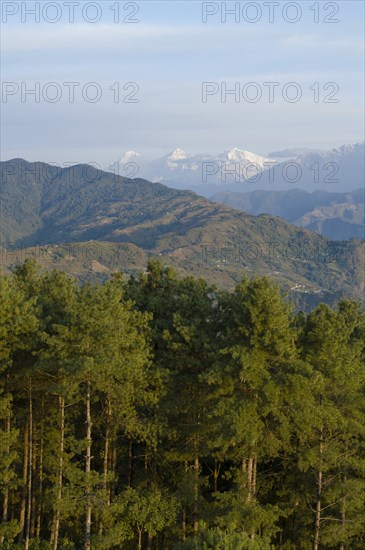 Nepal, Nagarkot, View across clouded Kathmandu valley towards Himalayan mountains. 
Photo Nic I Anson / Eye Ubiquitous