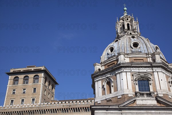 Italy, Lazio, Rome, Exterior of the Palazzo di Venezia museum with church dome in the foreground. 
Photo Stephen Rafferty / Eye Ubiquitous