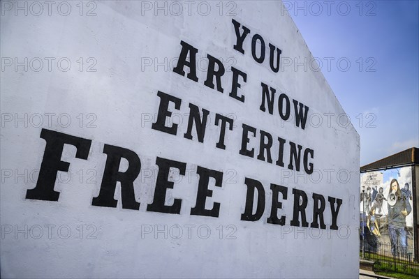 Ireland, North, Derry, Bogside Nationalist mural 'You Are Now Entering Free Derry' on old gable wall. . 
Photo Hugh Rooney