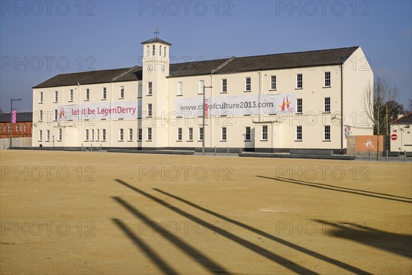 Ireland, North, Derry, Former Ebrington Barracks building with Derry 2013 Year of Culture banner. 
Photo Hugh Rooney