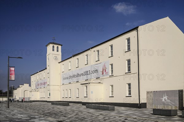 Ireland, North, Derry, Former Ebrington Barracks building with Derry 2013 Year of Culture banner. 
Photo Hugh Rooney