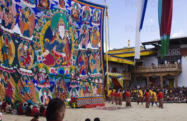 Bhutan, Gangtey Gompa, Thongdroel religious tapestry hanging from wall at the inauguration of new temple. 
Photo Nic I'Anson