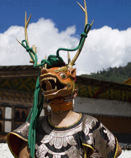 Bhutan, Bumthang District, Tamshing Lhakang, Masked dancer at Tsecchu. 
Photo Nic I'Anson