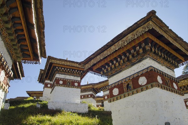 Bhutan, Dochu La, Chortens to commemorate victory of the 4th King in battle near Thimphu. 
Photo Nic I'Anson