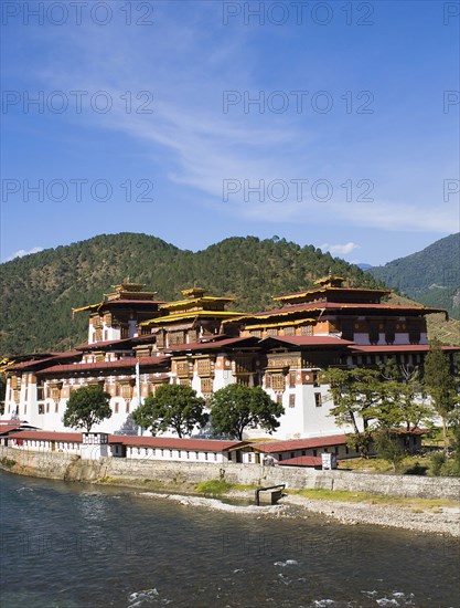 Bhutan, Punakha, Punakha Dzong beside river.