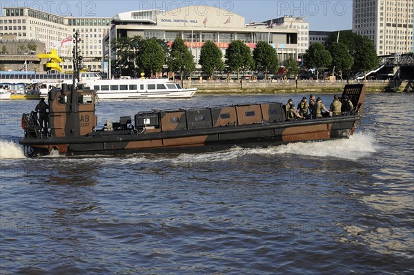 England, London, Royal Marines on board an Landing Craft Mk5 patrolling the River Thames during the 2012 Olympics. 
Photo Bob Battersby