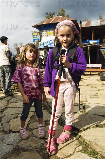 Nepal, Himalayas, Pokhara, Young English girls trekking in Nepali Himalayan hills near Pokhara. 
Photo NIc I Anson